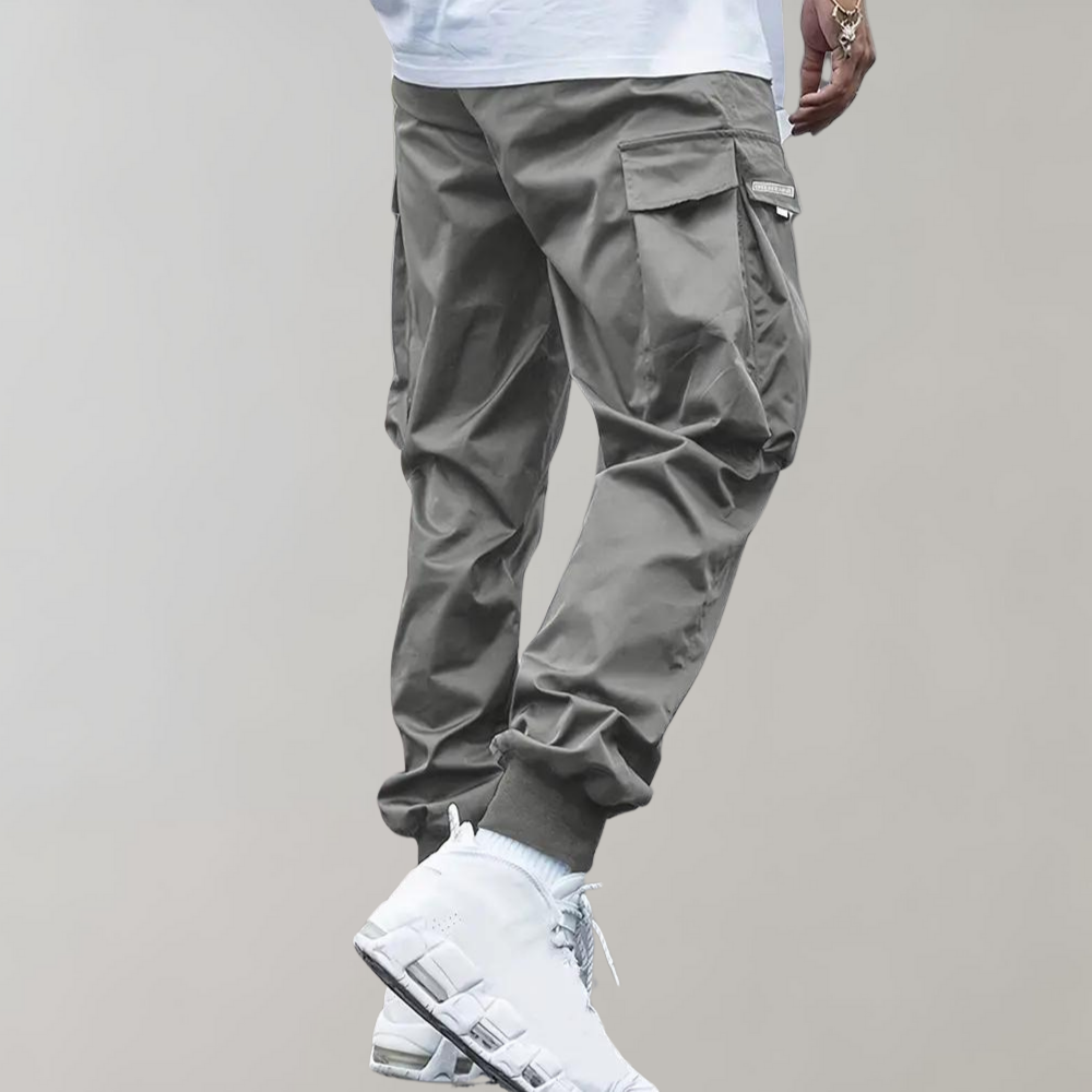 Alpenfeld | Herren Cargo Jogginghose – Lila Streetwear-Hose mit Reißverschlusstaschen & Bündchen