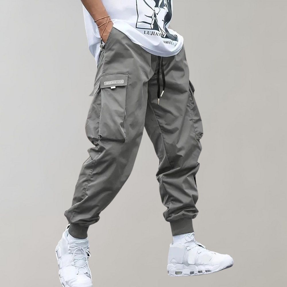 Alpenfeld | Herren Cargo Jogginghose – Lila Streetwear-Hose mit Reißverschlusstaschen & Bündchen